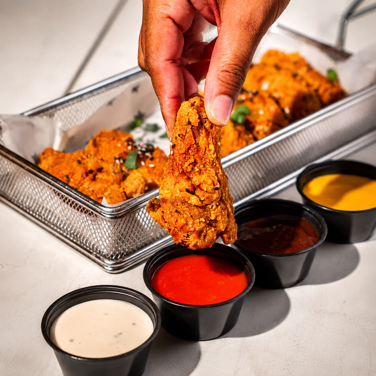All You Can Eat de Wings y Tenders por una hora para 2 personas por solo $20 en Beauty and The Butcher – Condado del Rey - Image 3